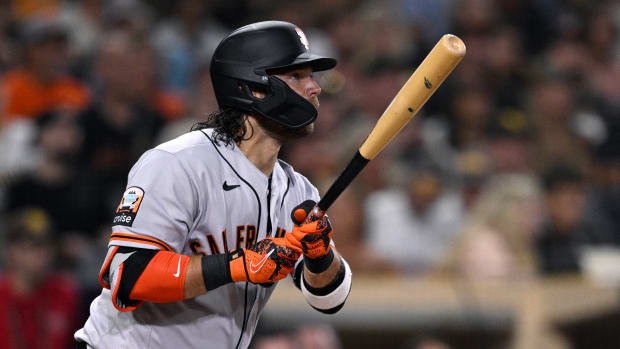 SF Giants shortstop Brandon Crawford (35) hits a sacrifice fly against the San Diego Padres at Petco Park (2023)